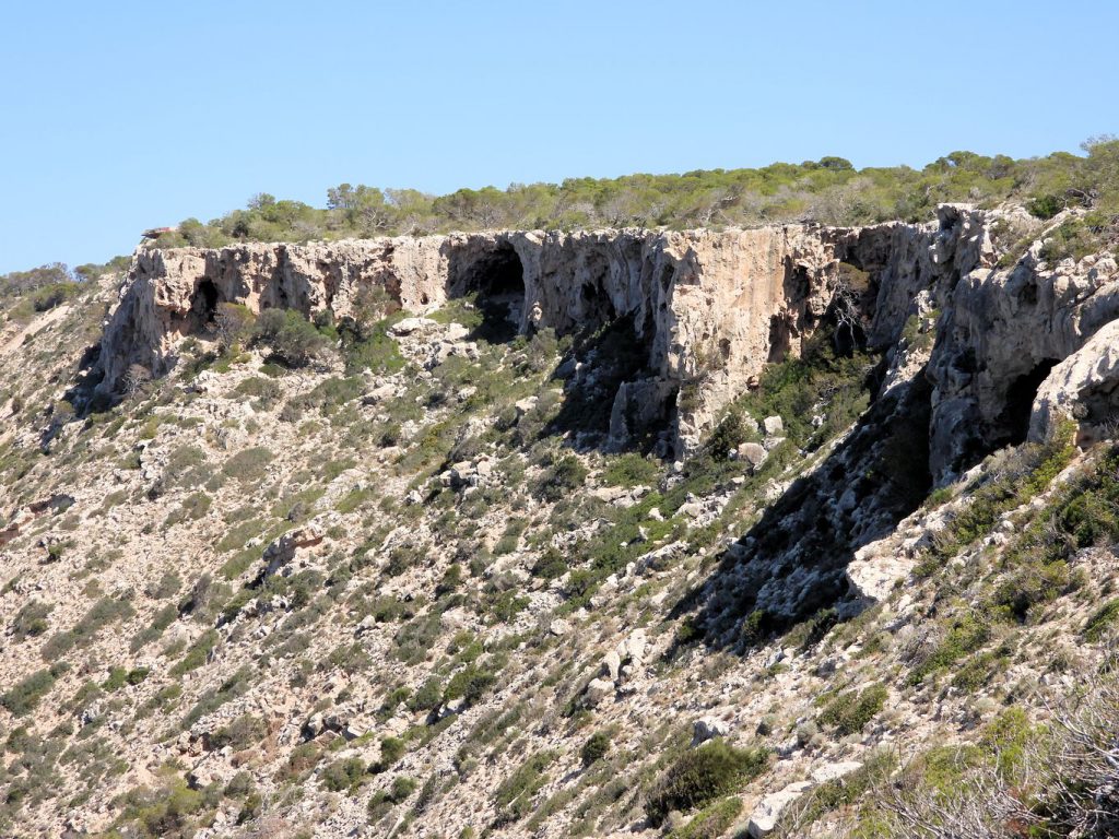 There are many caves in the cliffs, but they are difficult to access unless you are rappelling.